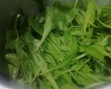 A picture of step 1 of Palak Matar.