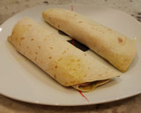 Foto del paso 7 de la receta: Wrap de pesto, jamón y queso