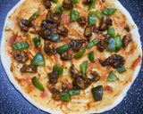 A picture of step 3 of Thin crust chicken shrimp pizza (stovetop).