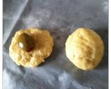 A picture of step 3 of Savory bites with olive stuffing.
