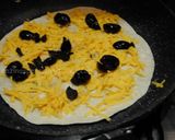 A picture of step 9 of Rozina’s Persian calzone pizza.