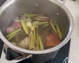 A picture of step 1 of Tom Yum Tilapia in Clear Soup.