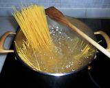 A picture of step 1 of Creamy Bacon Spaghetti.