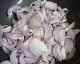 A picture of step 1 of Onion Pakoda.