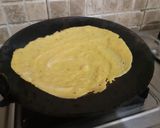 A picture of step 7 of Besan cheela with tamater chutney.