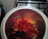 A picture of step 5 of Minji stew served with white rice.
