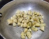 A picture of step 2 of Bengali Aloo Posto.