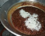 A picture of step 21 of Dodha Burfi with Daliya.
