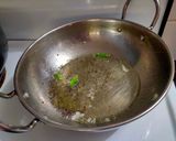 A picture of step 3 of Stuffed onion masala.