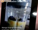 A picture of step 1 of Mango Orange Smoothie.