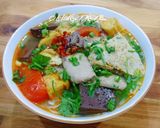 A picture of step 4 of Bún riêu cua đồng.