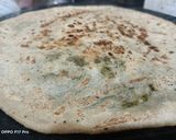 A picture of step 2 of Saag Wala paratha.