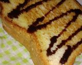 รูปขั้นตอนการทำที่ 3 ของ ขนมปังปิ้งราดซอสช็อกโกแลต (Toast with Chocolate Sauce)