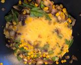 A picture of step 5 of Wok a Scramble!! 4 veg with Basil enthused oil in a scramble.