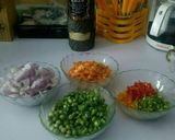 A picture of step 1 of Jollof rice with veggies with peppered chicken and goat meat.