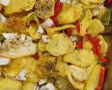 Foto del paso 4 de la receta: Lubina al horno con limón y patatas panaderas