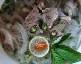 A picture of step 5 of Phở Bò (Vietnamese Beef Noodle Soup).