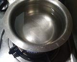 A picture of step 1 of Karak chai.