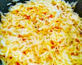 A picture of step 3 of Peele chawal/ zarda pulav.
