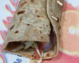 A picture of step 10 of Egg paratha roll.