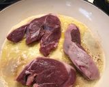 A picture of step 2 of Lamb steak with red wine and onion sauce.