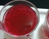 A picture of step 2 of Chia seeds and red drink.