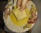 A picture of step 12 of Bihari Parcels with cheesy blast.