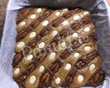 Foto del paso 15 de la receta: Brownie 2 chocolates con almendras y nueces