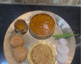 A picture of step 25 of Dal Bafla Baati Churma.