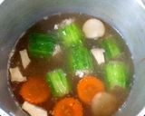 รูปขั้นตอนการทำที่ 6 ของ แกงจืดบวบยัดไส้ไก่สับ
