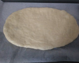 Foto del paso 6 de la receta: Coca de brioche con piñones