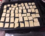 Foto del paso 2 de la receta: Galletitas de albahaca y ajo, en masa de hojaldre