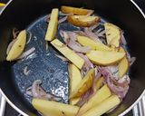 A picture of step 2 of Burnt Masala Parwal.