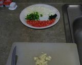 A picture of step 3 of Arroz Con Pollo.
