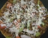 A picture of step 6 of Paratha Pizza.
