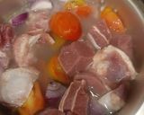 A picture of step 2 of پالک گوشت.