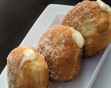 A picture of step 11 of Vanilla cream filled doughnuts.