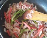 A picture of step 3 of Suji Upma with veggies.