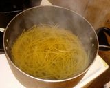 A picture of step 2 of Spaghetti Alfredo w Baby Bellas w sauteed garlic & onions.