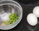 A picture of step 1 of Egg vegetable paniyaram.
