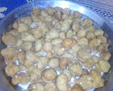 A picture of step 5 of Besan k dahi baray.