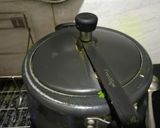 A picture of step 3 of Leftover kaddu ki sabzi moong dal khichdi.