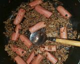 A picture of step 1 of Minced meat served in sausages and potatoes.