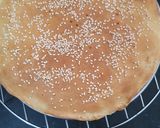 A picture of step 13 of Dilkush or sweet bread with coconut and tutti frutti filling.