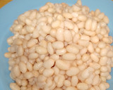 Foto del paso 6 de la receta: Calamarcitos en cebolla caramelizada y judías de Santa Pau