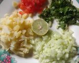 A picture of step 2 of Sprouts chat in cucumber boat.