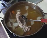 A picture of step 4 of Chicken Pho with Instant Seasoning Cubes.