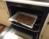 A picture of step 2 of Pretzel, Hershey kiss m'n m treats.