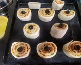 A picture of step 6 of Pizza Wheel Buns.