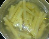Foto del paso 1 de la receta: Papas fritas triple cocción con cheddar y panceta